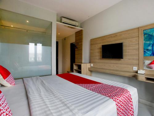 Imagen de la habitación del Hotel Collection O Bekasi Timur Near Gedung Juang Formerly Regia Tambun. Foto 14
