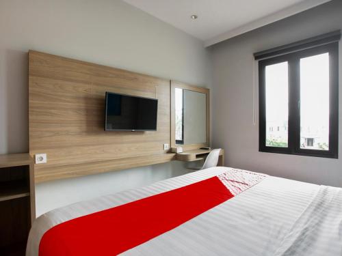 Imagen de la habitación del Hotel Collection O Bekasi Timur Near Gedung Juang Formerly Regia Tambun. Foto 15