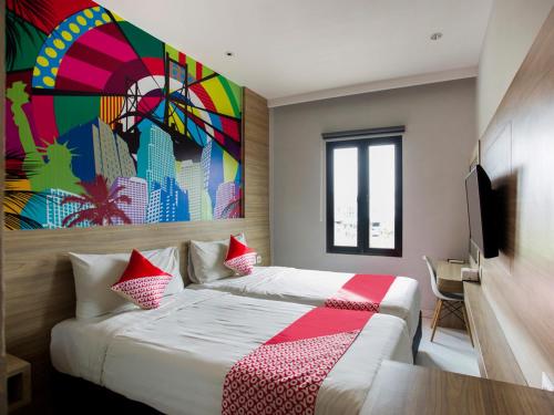 Imagen de la habitación del Hotel Collection O Bekasi Timur Near Gedung Juang Formerly Regia Tambun. Foto 20