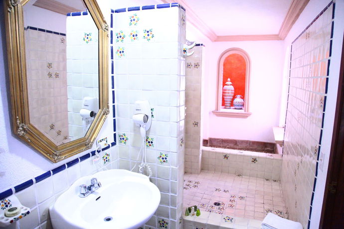 Imagen de la habitación del Hotel Collection O Casa Bella Hotel Boutique, Cabo San Lucas. Foto 6