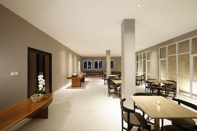 Imagen del bar/restaurante del Hotel Collection O Cihampelas Near Ciwalk Formerly Regia Cihampelas. Foto 3