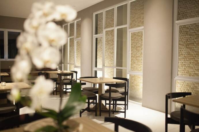 Imagen del bar/restaurante del Hotel Collection O Cihampelas Near Ciwalk Formerly Regia Cihampelas. Foto 4