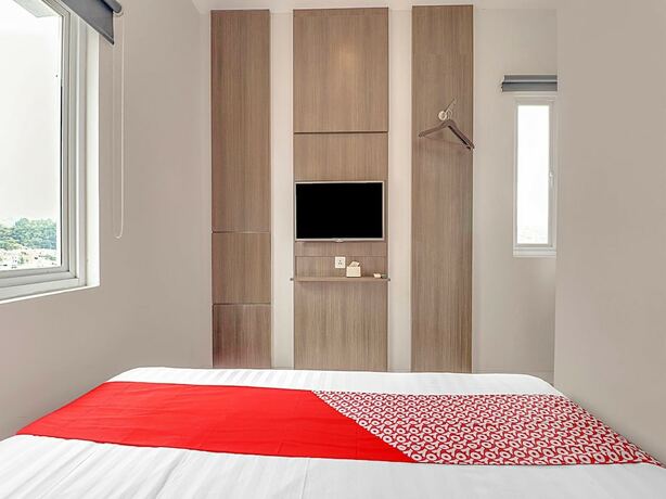 Imagen de la habitación del Hotel Collection O Cihampelas Near Ciwalk Formerly Regia Cihampelas. Foto 14