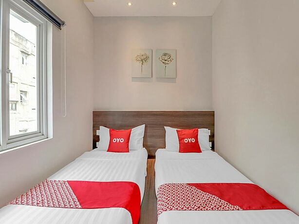 Imagen de la habitación del Hotel Collection O Cihampelas Near Ciwalk Formerly Regia Cihampelas. Foto 16
