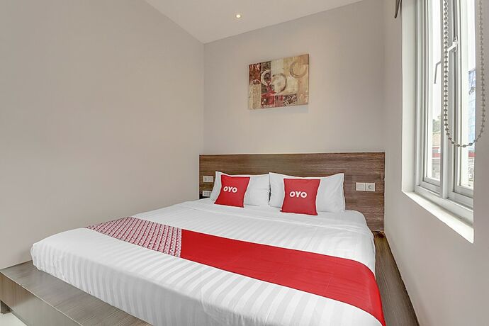 Imagen de la habitación del Hotel Collection O Cihampelas Near Ciwalk Formerly Regia Cihampelas. Foto 17