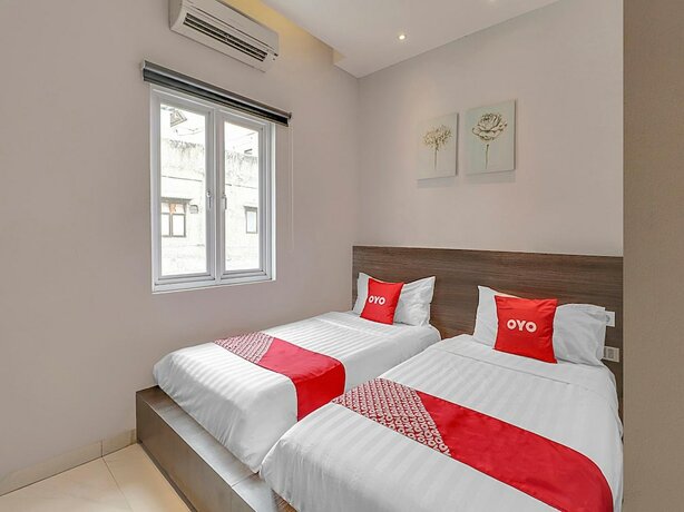 Imagen de la habitación del Hotel Collection O Cihampelas Near Ciwalk Formerly Regia Cihampelas. Foto 19