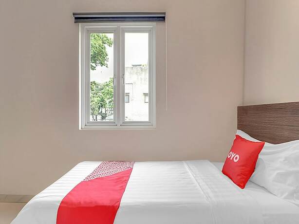 Imagen de la habitación del Hotel Collection O Cihampelas Near Ciwalk Formerly Regia Cihampelas. Foto 23