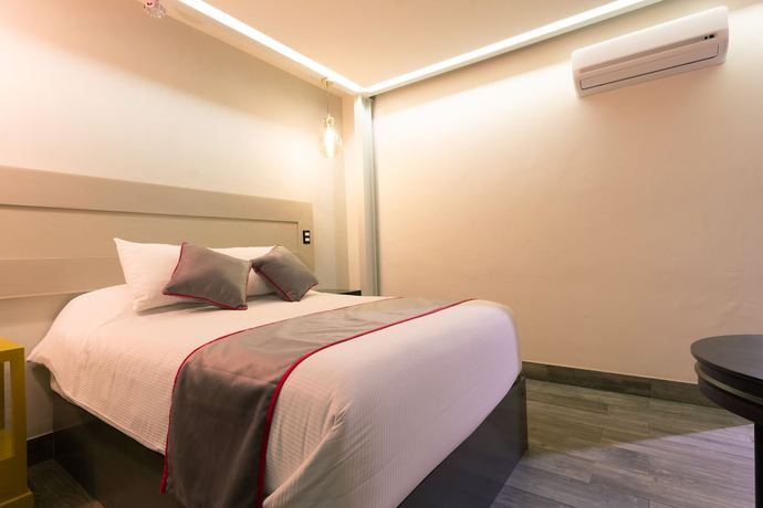 Imagen de la habitación del Hotel Collection O Coraz&oacute;n Del Caf&eacute; Boutique. Foto 3