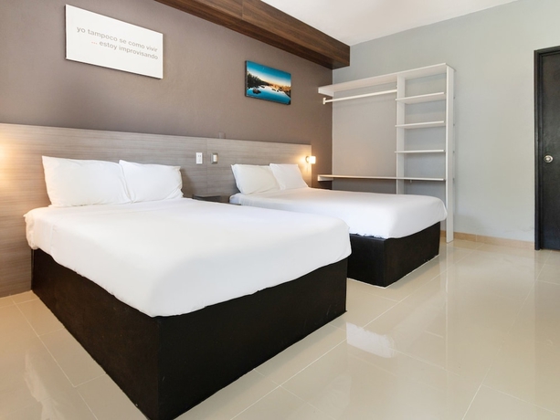 Imagen de la habitación del Hotel Collection O Hotel Mango,Six Flags Hurricane Harbor Oaxtepec. Foto 2