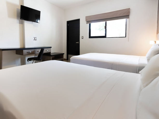 Imagen de la habitación del Hotel Collection O Hotel Mango,Six Flags Hurricane Harbor Oaxtepec. Foto 6