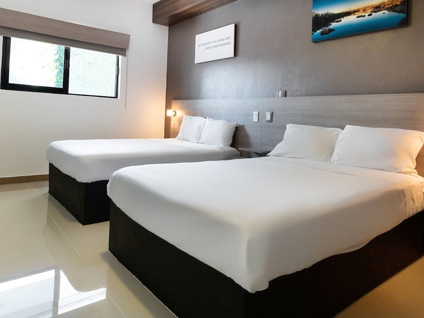 Imagen de la habitación del Hotel Collection O Hotel Mango,Six Flags Hurricane Harbor Oaxtepec. Foto 7