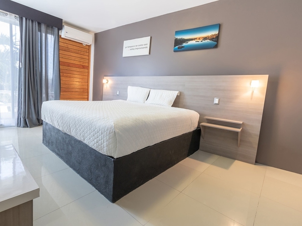 Imagen de la habitación del Hotel Collection O Hotel Mango,Six Flags Hurricane Harbor Oaxtepec. Foto 11