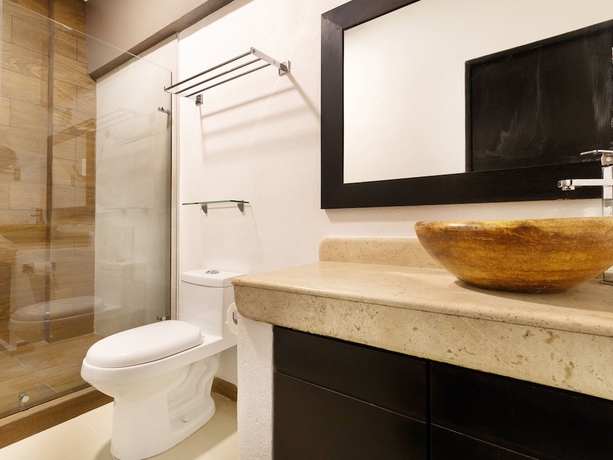 Imagen de la habitación del Hotel Collection O Hotel Mango,Six Flags Hurricane Harbor Oaxtepec. Foto 12