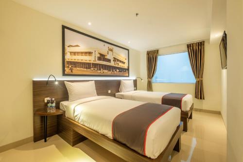 Imagen de la habitación del Hotel Collection O Hotel Pasar Baru Heritage. Foto 8