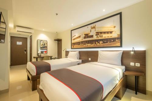 Imagen de la habitación del Hotel Collection O Hotel Pasar Baru Heritage. Foto 10
