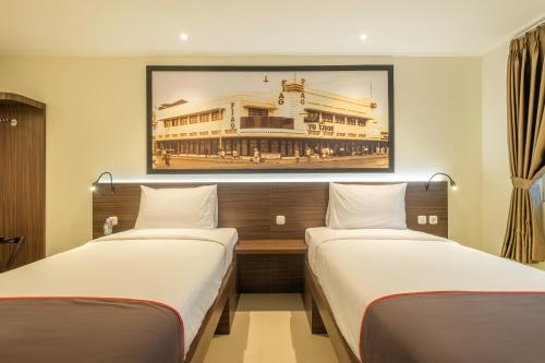 Imagen de la habitación del Hotel Collection O Hotel Pasar Baru Heritage. Foto 13