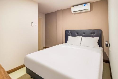 Imagen de la habitación del Hotel Collection O Kebon Jeruk Near Paskal 23 Formerly Sentral Paskal. Foto 11