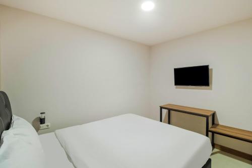 Imagen de la habitación del Hotel Collection O Kebon Jeruk Near Paskal 23 Formerly Sentral Paskal. Foto 16