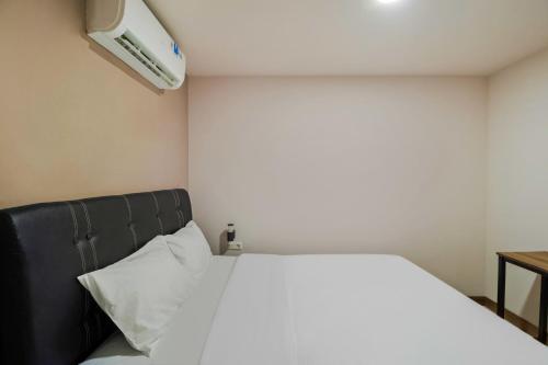 Imagen de la habitación del Hotel Collection O Kebon Jeruk Near Paskal 23 Formerly Sentral Paskal. Foto 17