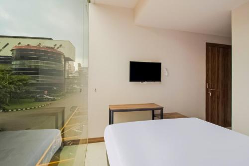 Imagen de la habitación del Hotel Collection O Kebon Jeruk Near Paskal 23 Formerly Sentral Paskal. Foto 18