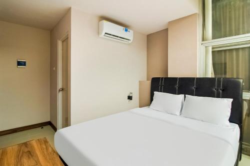 Imagen de la habitación del Hotel Collection O Kebon Jeruk Near Paskal 23 Formerly Sentral Paskal. Foto 19