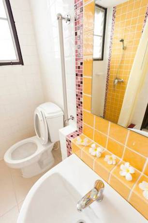 Imagen de la habitación del Hotel Collection O Lai Thai Guesthouse. Foto 4