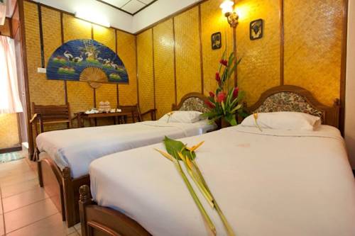 Imagen de la habitación del Hotel Collection O Lai Thai Guesthouse. Foto 6