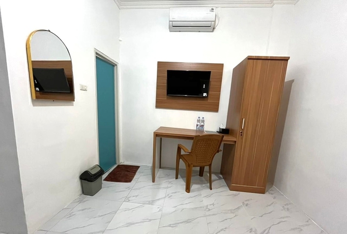Imagen de la habitación del Hotel Collection O PH18 Bandar Lampung. Foto 1