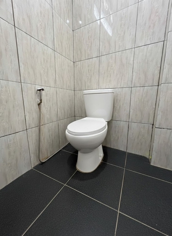 Imagen de la habitación del Hotel Collection O PH18 Bandar Lampung. Foto 3