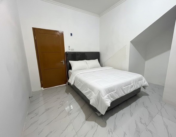 Imagen de la habitación del Hotel Collection O PH18 Bandar Lampung. Foto 4