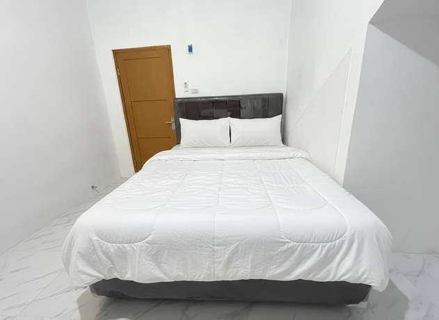 Imagen de la habitación del Hotel Collection O PH18 Bandar Lampung. Foto 5