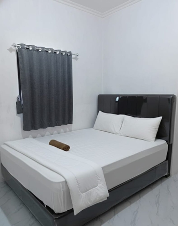Imagen de la habitación del Hotel Collection O PH18 Bandar Lampung. Foto 6