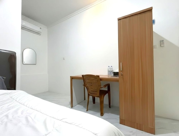 Imagen de la habitación del Hotel Collection O PH18 Bandar Lampung. Foto 7