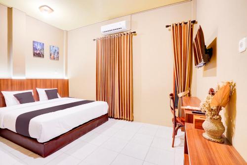 Imagen general del Hotel Collection O Padang City Center Near Transmart Padang Formerly De Orchids. Foto 13