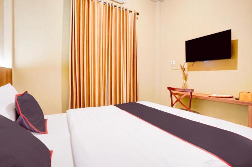 Imagen general del Hotel Collection O Padang City Center Near Transmart Padang Formerly De Orchids. Foto 14