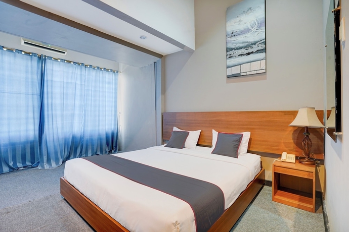 Imagen de la habitación del Hotel Collection O Padang near Mesjid Raya Syekh Ahmad Al-Minangkabawi formerly Surya Palace. Foto 4