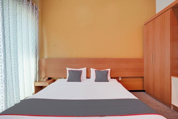 Imagen de la habitación del Hotel Collection O Padang near Mesjid Raya Syekh Ahmad Al-Minangkabawi formerly Surya Palace. Foto 8