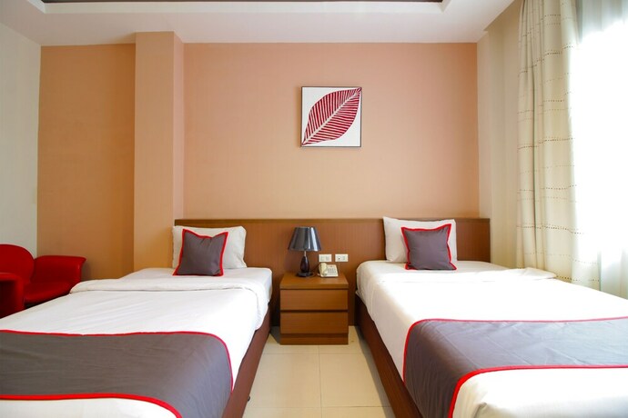 Imagen de la habitación del Hotel Collection O Pasteur Near Paris Van Java Mall Formerly Sweet Karina. Foto 6