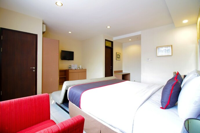 Imagen de la habitación del Hotel Collection O Pasteur Near Paris Van Java Mall Formerly Sweet Karina. Foto 7