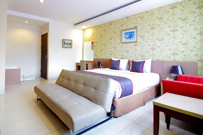 Imagen de la habitación del Hotel Collection O Pasteur Near Paris Van Java Mall Formerly Sweet Karina. Foto 14