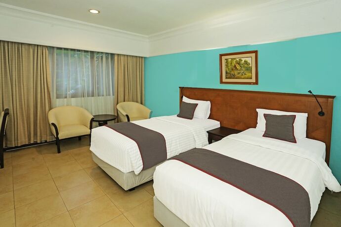Imagen de la habitación del Hotel Collection O Series. Foto 11