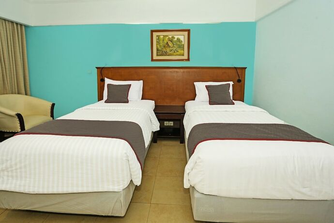 Imagen de la habitación del Hotel Collection O Series. Foto 12
