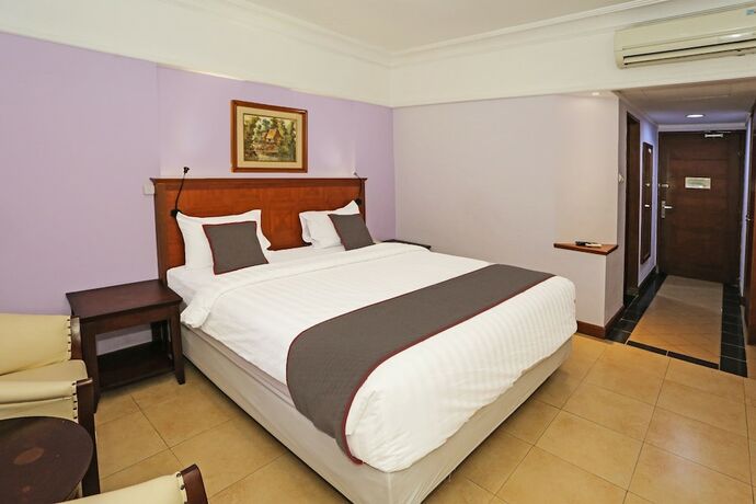 Imagen de la habitación del Hotel Collection O Series. Foto 13
