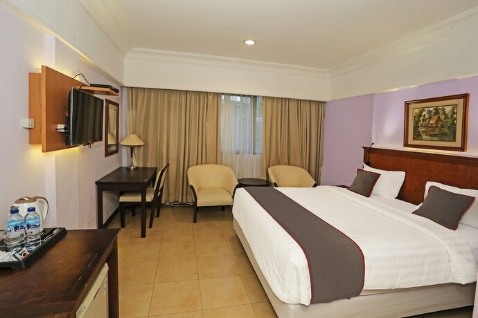 Imagen de la habitación del Hotel Collection O Series. Foto 14