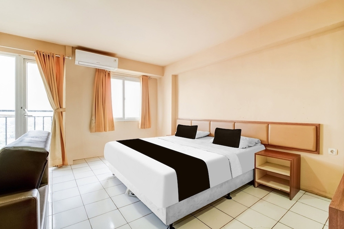 Imagen de la habitación del Hotel Collection O Serviced Apartmen Mutiara Kota. Foto 1