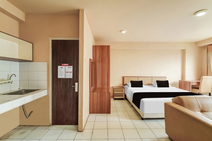 Imagen de la habitación del Hotel Collection O Serviced Apartmen Mutiara Kota. Foto 2