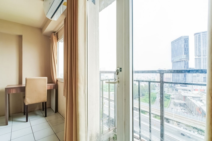 Imagen de los interiores del Hotel Collection O Serviced Apartmen Mutiara Kota. Foto 6