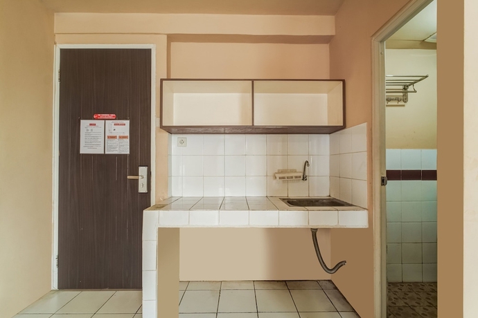 Imagen de los interiores del Hotel Collection O Serviced Apartmen Mutiara Kota. Foto 10