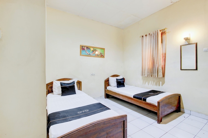 Imagen de la habitación del Hotel Collection O Stasiun Pekalongan Near Stasiun Kereta Api Formerly Indah. Foto 3