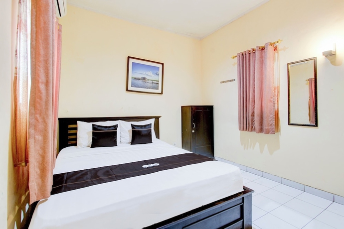 Imagen de la habitación del Hotel Collection O Stasiun Pekalongan Near Stasiun Kereta Api Formerly Indah. Foto 4